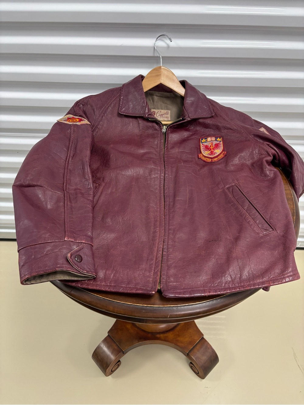 Capelli of New York Burgundy Leather Bomber Jacket with Crest Patch
